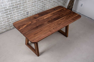 small walnut dining table on walnut angle legs