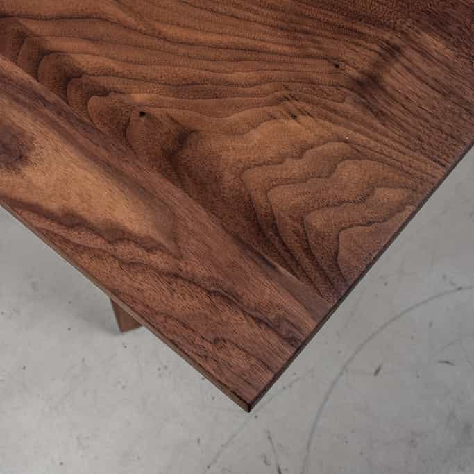 corner of a Walnut table 48