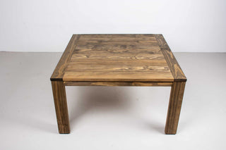 square outdoor patio table on parson style base