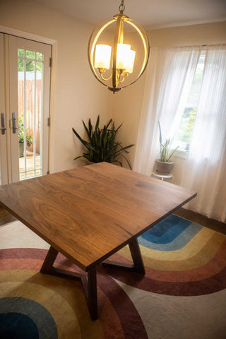 square walnut center extension table with bevel edge