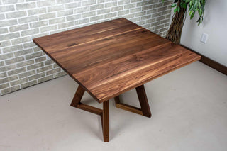 square walnut end extension dining table