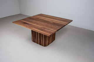 square walnut pedestal table on tambour style base