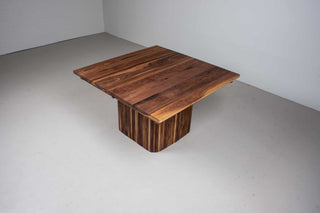 square walnut expandable table on fluted midcentury base