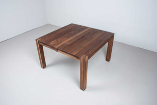 square walnut extension table on estling parson base
