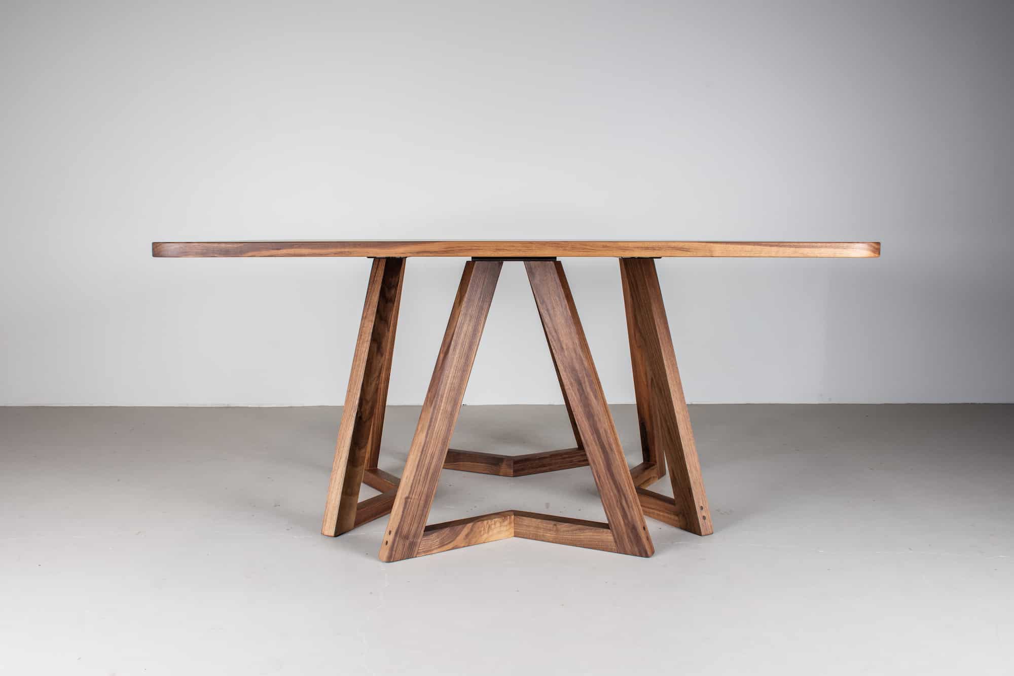 square walnut table on 4 walnut chevron legs