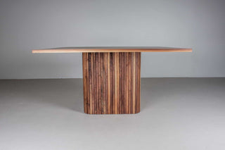 square walnut table on fluted walnut pedestal base