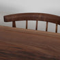 detail of walnut dining chair with spindles