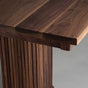 corner detail of a Walnut table 36