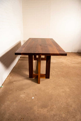 walnut harvest table on double cross pedestal base