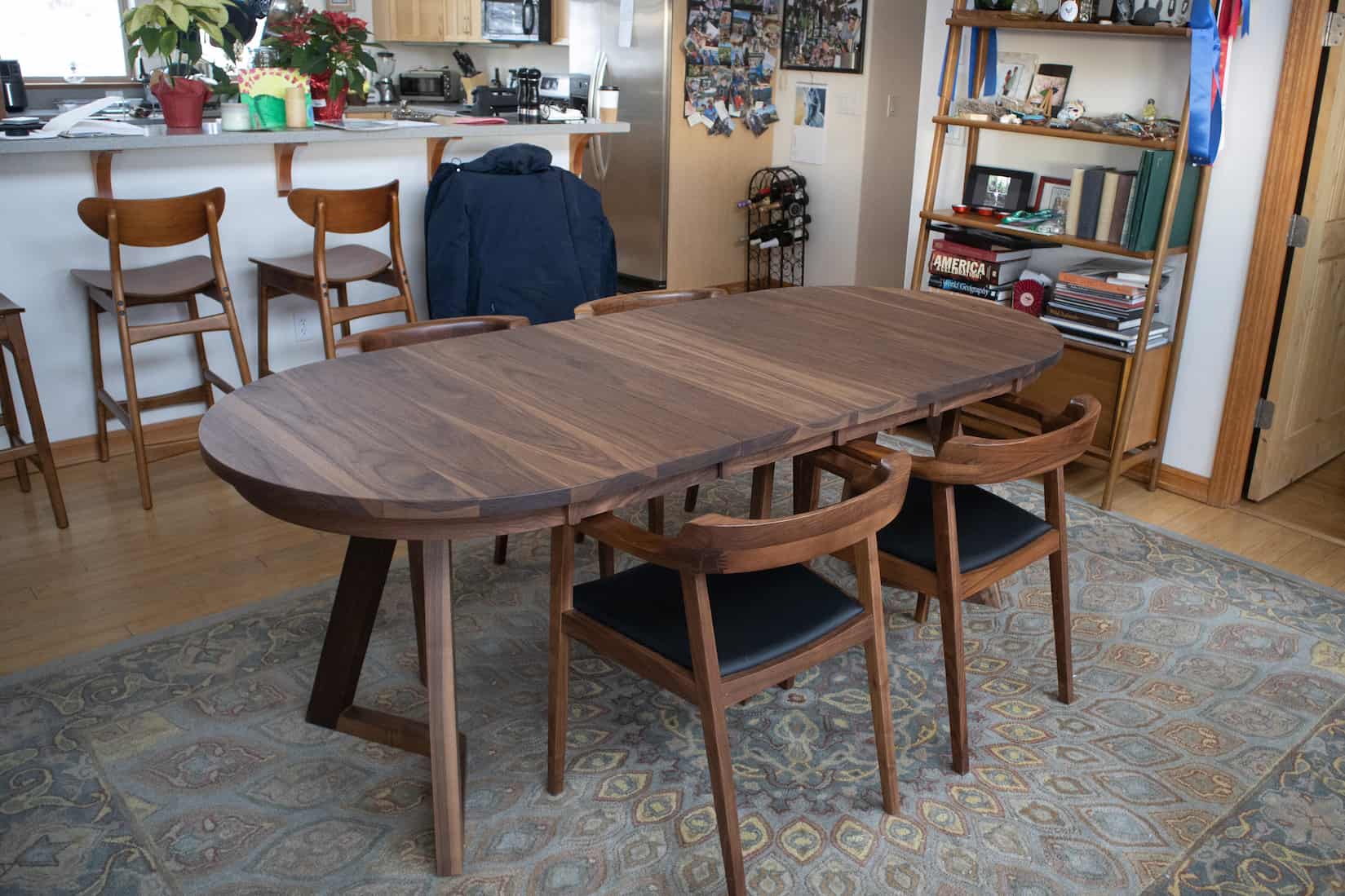 oval walnut extendable table