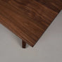 corner detail of a Walnut table 36