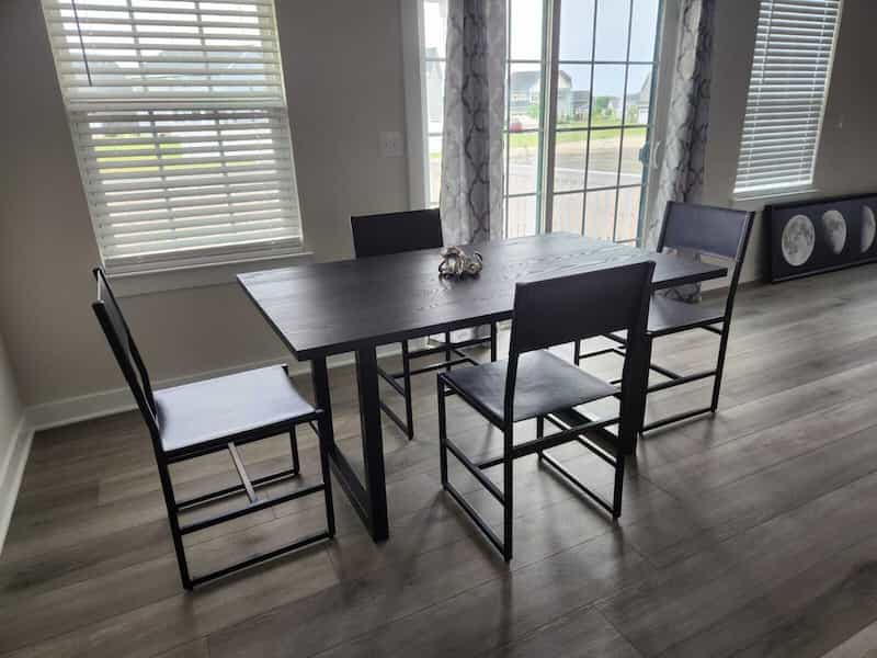 walnut table on steel legs
