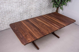 walnut farmhouse extendable table on trestle base