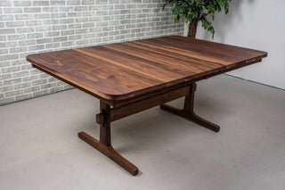 walnut farmhouse extendable table on trestle base