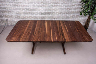 walnut farmhouse extendable table on trestle base
