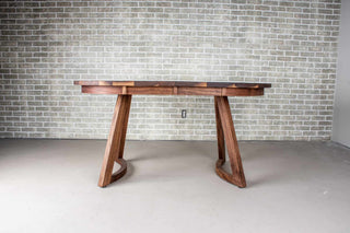 walnut racetrack oval extendable table on midcentury modern legs