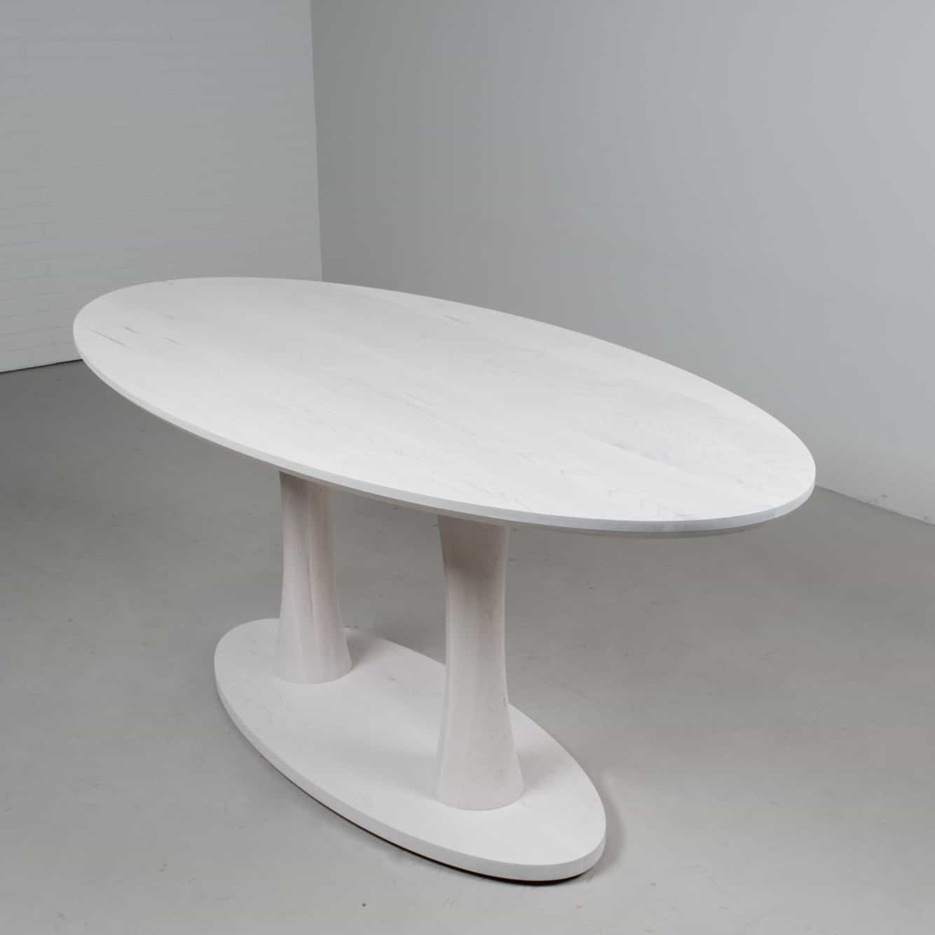 white oval double pedestal table