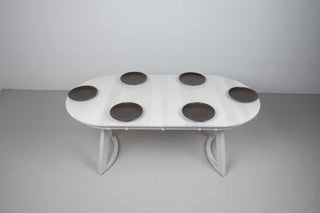 small white ash extendable oval dining table on curved chevron legs