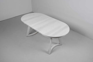 small white ash extendable oval dining table on curved chevron legs