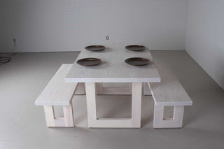 white wood kitchen table with 2 benches