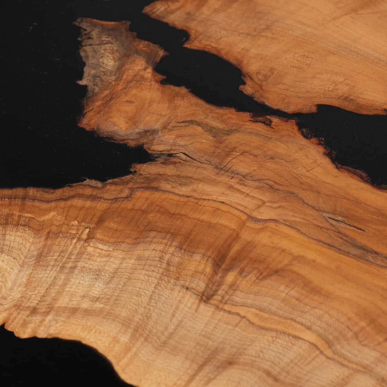 maple table with black epoxy