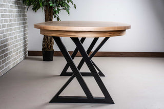 extendable oval dining table in rock maple on black steel legs