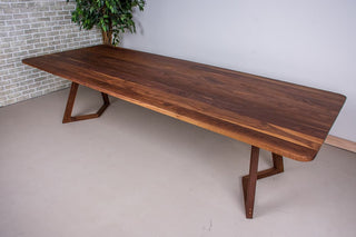 Walnut dining table on walnut chevron legs