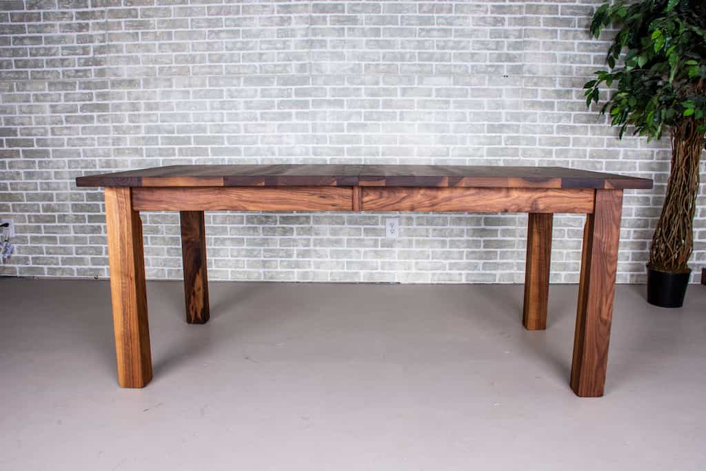walnut extendable table on parsons base