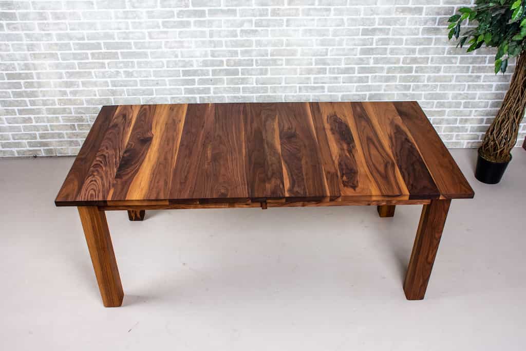 walnut extendable table on parsons base