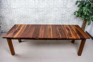 walnut extendable table on parsons base