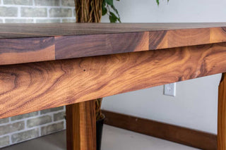 walnut extendable table on parsons base