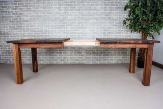 walnut extendable table on parsons base