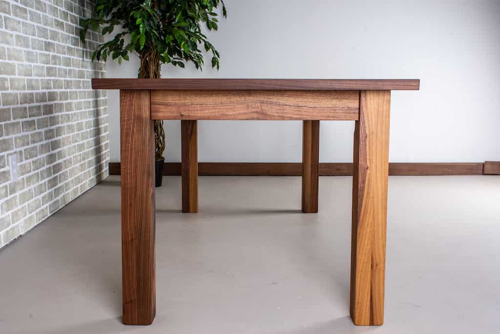 walnut extendable table on parsons base