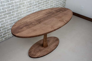 maple oval table on Jennings base
