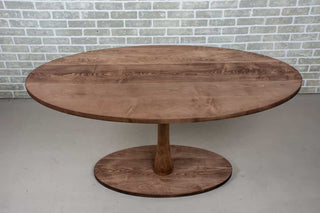 maple oval table on Jennings base