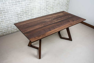 blackened walnut end extension table on walnut chevron legs