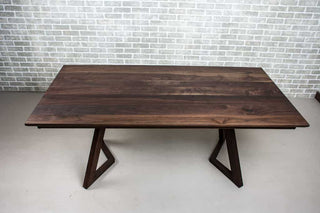 blackened walnut end extension table on walnut chevron legs