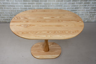 Jarvis Oval Pedestal Table in Natural Ash