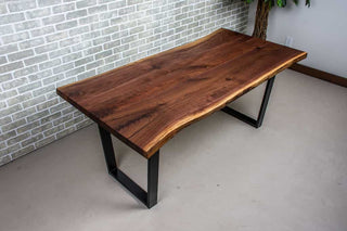 live edge walnut table on black steel angle legs