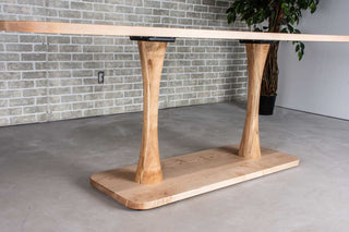 long wood dining table in maple on double pedestal base