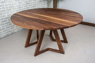 Round walnut dining table. 