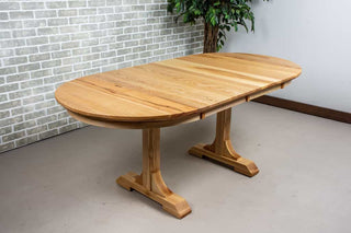 wood oval extendable table on T legs