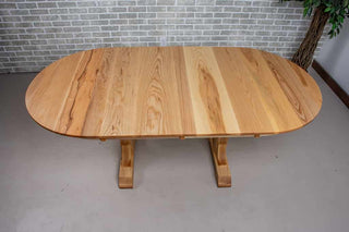 wood oval extendable table on T legs