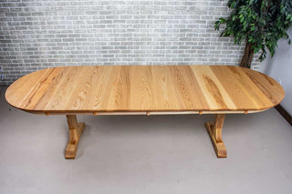 wood oval extendable table on T legs