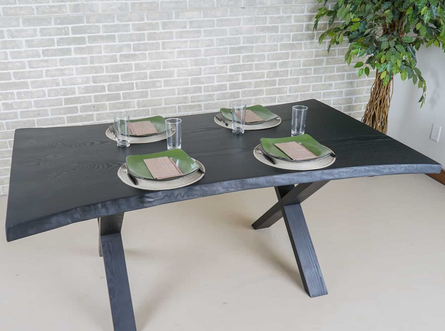 live edge ash bookmatch table on wood legs finished in black