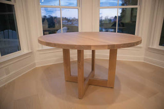 round oak table on cross base