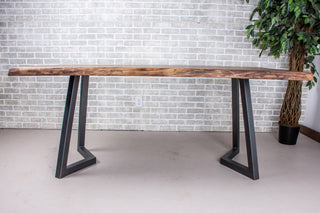 Live edge walnut table on gunmetal grey steel legs.