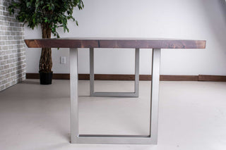 live edge walnut table on square steel legs finished in nickel