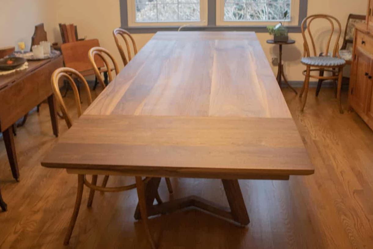walnut end extension table on wood legs