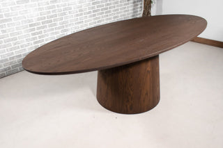 Elliptical oval oak table on a cone base in espresso